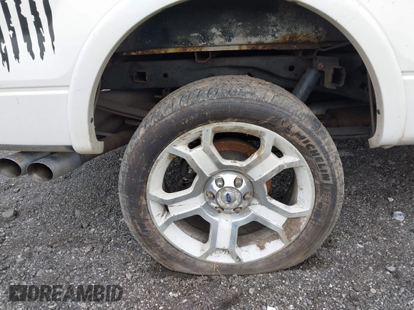 2011 Ford F-150 Lariat with VIN 1FTFW1E63BFB80098, listed as a IAAI auction lot 42038087 with 243,992 mi miles. Bid and sale history available at carsss.com. Image 21.