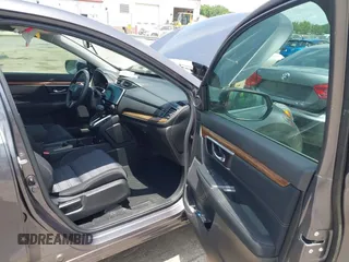 2020 Honda CR-V EX with VIN 2HKRW1H58LH407583, listed as a IAAI auction lot 42446451 with 48,476 mi miles and . Bid and sale history available at DreamBid. Image 5.