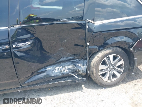 2015 Honda Odyssey Touring Elite with VIN 5FNRL5H90FB003506, listed as a IAAI auction lot 42585049 with 120,543 mi miles and . Bid and sale history available at DreamBid. Image 6.