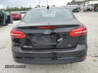 2017 Ford Focus SE with VIN 1FADP3F22HL291799, listed as a Copart auction lot 53789195 with 81,646 mi miles and Salvage title. Bid and sale history available at DreamBid. Image 6.