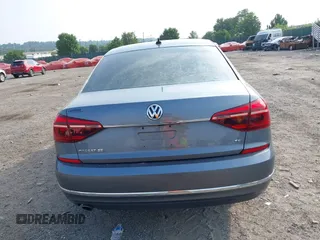2017 Volkswagen Passat SE with VIN 1VWBT7A35HC063362, listed as a IAAI auction lot 42435453 with 76,341 mi miles and . Bid and sale history available at DreamBid. Image 15.