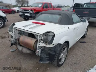2003 Toyota MR2 Spyder with VIN JTDFR320X30062525, listed as a IAAI auction lot 41558074 with 42,493 mi miles. Bid and sale history available at carsss.com. Image 4.