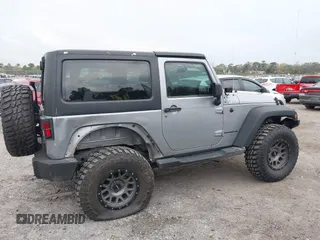 2014 Jeep Wrangler Sport with VIN 1C4AJWAG0EL265409, listed as a IAAI auction lot 41726935 with 78,547 mi miles and . Bid and sale history available at DreamBid. Image 14.
