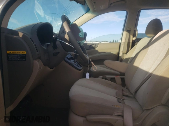 2011 Kia Sedona LX with VIN KNDMG4C74B6370803, listed as a Copart auction lot 77228344 with 142,394 mi miles and Salvage Title. Bid and sale history available at DreamBid. Image 7.