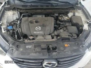 2016 Mazda CX-5 Sport with VIN JM3KE2BY0G0729349, listed as a Copart auction lot 62469735 with 88,247 mi miles and Salvage title. Bid and sale history available at DreamBid. Image 12.