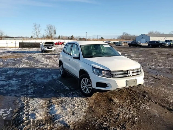 2012 Volkswagen Tiguan LE with VIN WVGAV7AXXCW568697, listed as a Copart auction lot 43210435 with 181,249 mi miles and Salvage title. Bid and sale history available at DreamBid. Image 12.