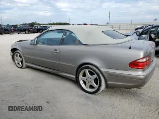 2003 Mercedes-Benz CLK 430 with VIN WDBLK70G73T131537, listed as a Copart auction lot 84103354 with 144,308 mi miles and Salvage Title. Bid and sale history available at DreamBid. Image 2.