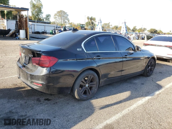 2017 BMW 3 Series 330e iPerformance with VIN WBA8E1C36HA030087, listed as a Copart auction lot 51918735 with 122,240 mi miles and Clean Title. Bid and sale history available at carsss.com. Image 3.
