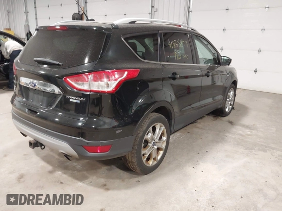 2014 Ford Escape Titanium with VIN 1FMCU9J96EUE26645, listed as a IAAI auction lot 41835893 with 83,730 mi miles. Bid and sale history available at carsss.com. Image 4.