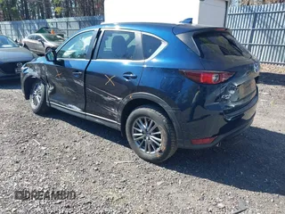 2017 Mazda CX-5 Touring with VIN JM3KFBCL5H0193919, listed as a IAAI auction lot 41751832 with 62,694 mi miles. Bid and sale history available at carsss.com. Image 3.