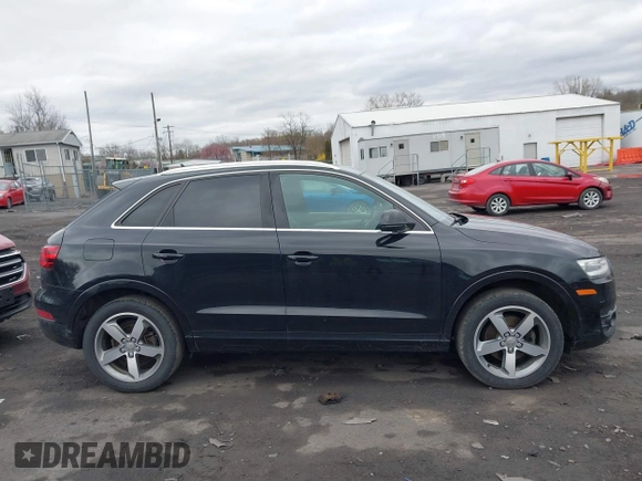 2015 Audi Q3 Premium Plus z VIN WA1EFCFS6FR012425, wystawiony jako IAAI lot #42042484 z przebiegiem 139 012 mil mil oraz . Historia ofert i sprzedaży dostępna na DreamBid. Obrazek 13.