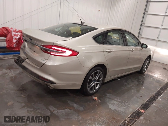 2017 Ford Fusion SE with VIN 3FA6P0HD1HR275097, listed as a IAAI auction lot 41791961 with 136,887 mi miles. Bid and sale history available at carsss.com. Image 4.