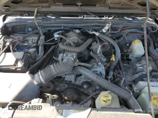 2009 Jeep Wrangler X with VIN 1J4FA24139L730383, listed as a Copart auction lot 51914935 with 168,265 mi miles and Salvage Title. Bid and sale history available at DreamBid. Image 12.