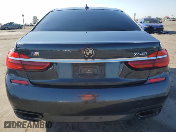 2016 BMW 7 Series 750i with VIN WBA7F0C57GGL99332, listed as a Copart auction lot 56144533 with 95,626 mi miles. Bid and sale history available at carsss.com. Image 6.