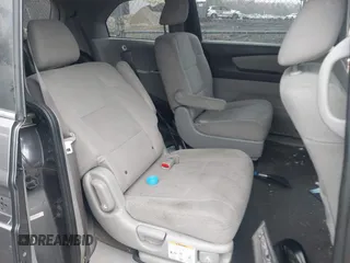 2014 Honda Odyssey LX z VIN 5FNRL5H2XEB009962, wystawiony jako IAAI lot #41902277 z przebiegiem 152 661 mil mil oraz . Historia ofert i sprzedaży dostępna na DreamBid. Obrazek 8.