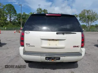 2009 GMC Yukon Denali z VIN 1GKFK032X9R236556, wystawiony jako IAAI lot #40805429 z przebiegiem 183 042 mil mil oraz . Historia ofert i sprzedaży dostępna na DreamBid. Obrazek 16.