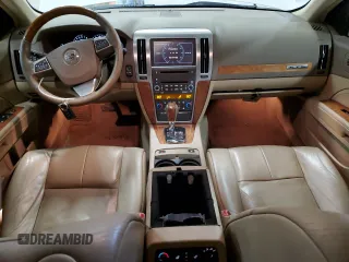 2010 Cadillac STS AWD z VIN 1G6DU6EV0A0106434, wystawiony jako Copart lot #52439915 z przebiegiem 90 187 mil mil oraz Czysty tytuł • Clean title. Historia ofert i sprzedaży dostępna na DreamBid. Obrazek 8.