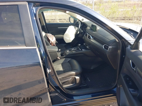 2019 Mazda CX-5 Touring with VIN JM3KFBCM8K0518806, listed as a IAAI auction lot 42038168 with 61,449 mi miles and . Bid and sale history available at DreamBid. Image 5.