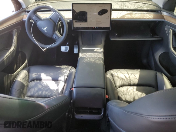 2022 Tesla Model Y Performance z VIN 7SAYGDEF0NF540933, wystawiony jako Copart lot #56087145 z przebiegiem 59 717 mil mil oraz Szkoda całkowita • Salvage title. Historia ofert i sprzedaży dostępna na DreamBid. Obrazek 8.