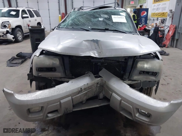 2005 Chevrolet TrailBlazer LT with VIN 1GNDT13SX52357796, listed as a IAAI auction lot 41510963 with 218,766 mi miles. Bid and sale history available at carsss.com. Image 12.