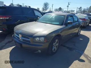 2010 Dodge Charger SXT with VIN 2B3CA3CV6AH185978, listed as a IAAI auction lot 41661822 with 166,601 mi miles. Bid and sale history available at carsss.com. Image 2.