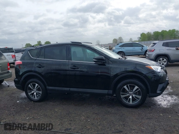 2018 Toyota RAV4 XLE with VIN 2T3WFREV9JW412755, listed as a IAAI auction lot 41889960 with 216,451 mi miles and . Bid and sale history available at carsss.com. Image 13.