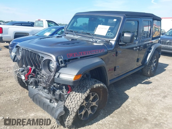 2021 Jeep Wrangler Unlimited Rubicon with VIN 1C4HJXFN5MW509483, listed as a IAAI auction lot 42245703 with 59,461 mi miles and . Bid and sale history available at DreamBid. Image 17.