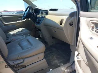 2003 Honda Odyssey EX-L with VIN 5FNRL18993B127164, listed as a IAAI auction lot 42474080 with 152,838 mi miles and . Bid and sale history available at DreamBid. Image 5.