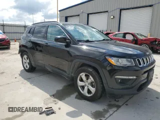 2017 Jeep Compass Latitude with VIN 3C4NJCBB0HT611440, listed as a Copart auction lot 57401485 with 128,319 mi miles and Salvage title. Bid and sale history available at DreamBid. Image 4.