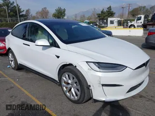 2022 Tesla Model X with VIN 7SAXCBE58NF336321, listed as a IAAI auction lot 41458205 with 21,916 mi miles. Bid and sale history available at carsss.com. Image 1.