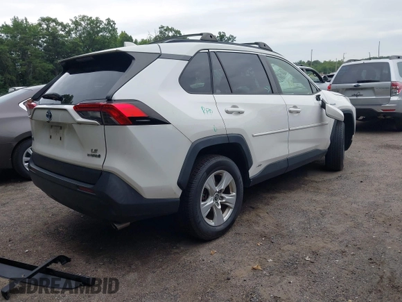 2019 Toyota RAV4 Hybrid LE with VIN JTMMWRFV9KD021285, listed as a IAAI auction lot 42757660 with 74,870 mi miles and . Bid and sale history available at DreamBid. Image 4.