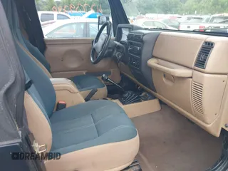2001 Jeep Wrangler Sahara with VIN 1J4FA59S41P376079, listed as a IAAI auction lot 42739280 with 255,999 mi miles and . Bid and sale history available at DreamBid. Image 5.