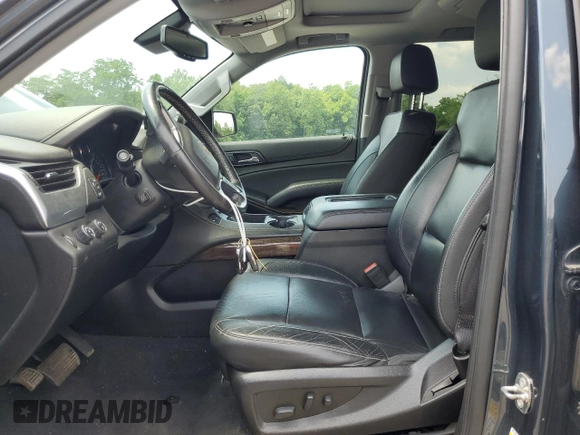 2020 Chevrolet Tahoe LT with VIN 1GNSKBKC0LR260766, listed as a Copart auction lot 61465725 with 104,850 mi miles and Salvage title. Bid and sale history available at DreamBid. Image 7.