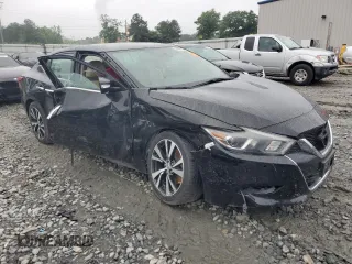 2018 Nissan Maxima SV with VIN 1N4AA6AP6JC363005, listed as a Copart auction lot 59487735 with 75,452 mi miles and Salvage title. Bid and sale history available at DreamBid. Image 4.