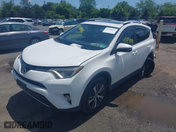 2016 Toyota RAV4 XLE with VIN JTMRFREV0GJ073114, listed as a IAAI auction lot 42548094 with 119,431 mi miles and . Bid and sale history available at DreamBid. Image 17.