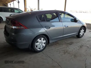 2012 Honda Insight z VIN JHMZE2H38CS004159, wystawiony jako Copart lot #60316925 z przebiegiem 142 601 mil mil oraz Szkoda całkowita • Salvage title. Historia ofert i sprzedaży dostępna na DreamBid. Obrazek 3.