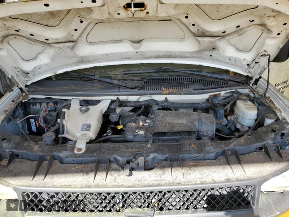 2011 Chevrolet Express Cargo z VIN 1GCZGTCG9B1186826, wystawiony jako Copart lot #82085794 z przebiegiem 202 697 mil mil oraz Nie do naprawy • Non repairable. Historia ofert i sprzedaży dostępna na DreamBid. Obrazek 12.