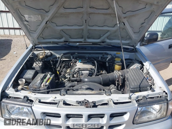 2001 Isuzu Rodeo S with VIN 4S2DM58WX14352481, listed as a IAAI auction lot 41796652 with 162,696 mi miles and . Bid and sale history available at DreamBid. Image 10.