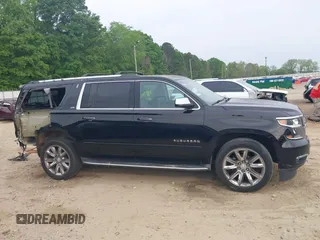 2015 Chevrolet Suburban LTZ with VIN 1GNSCKKCXFR731873, listed as a IAAI auction lot 42069917 with 108,963 mi miles and . Bid and sale history available at DreamBid. Image 14.