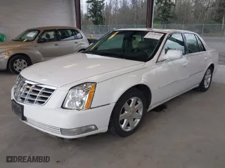2007 Cadillac DTS Luxury I with VIN 1G6KD57Y87U160493, listed as a IAAI auction lot 41938528 with 162,774 mi miles. Bid and sale history available at carsss.com. Image 2.