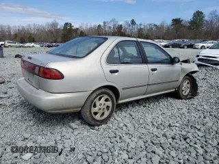 1999 Nissan Sentra XE with VIN 1N4AB41D6XC717640, listed as a Copart auction lot 47634695 with 286,038 mi miles and Salvage title. Bid and sale history available at DreamBid. Image 3.