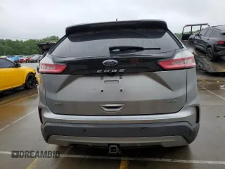 2021 Ford Edge SEL с VIN 2FMPK4J92MBA11014, выставлен на аукционе Copart как лот 61131095 с пробегом 64 316 миль миль и Списание • Salvage title. История ставок и продаж доступна на DreamBid. Изображение 6.