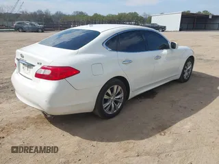 2013 Infiniti M37 with VIN JN1BY1AP3DM513084, listed as a IAAI auction lot 41903753 with 139,864 mi miles. Bid and sale history available at carsss.com. Image 4.