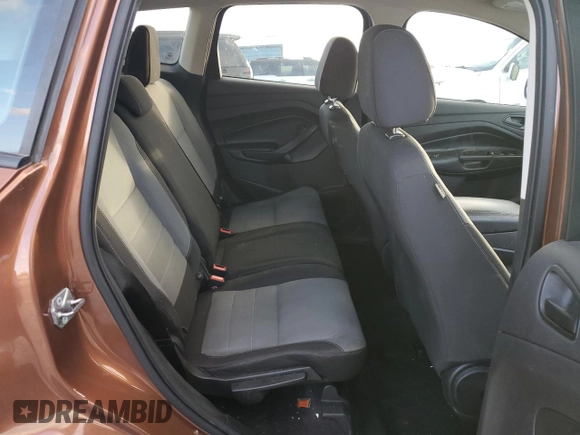 2017 Ford Escape S with VIN 1FMCU0F79HUE12519, listed as a Copart auction lot 86373094 with 144,446 mi miles and Salvage title. Bid and sale history available at DreamBid. Image 11.