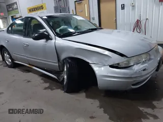 2003 Oldsmobile Alero GL1 z VIN 1G3NL52F53C112582, wystawiony jako IAAI lot #41926039 z przebiegiem 124 769 mil mil oraz . Historia ofert i sprzedaży dostępna na DreamBid. Obrazek 1.