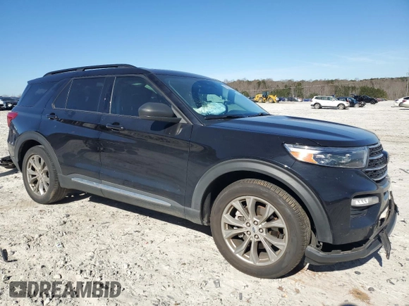 2021 Ford Explorer XLT with VIN 1FMSK7DH2MGC06991, listed as a Copart auction lot 48494615 with 61,222 mi miles and Salvage Title. Bid and sale history available at carsss.com. Image 4.