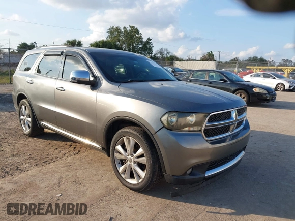 2011 Dodge Durango Crew with VIN 1D4SD4GT0BC630240, listed as a IAAI auction lot 41494046 with 174,343 mi miles and . Bid and sale history available at DreamBid. Image 1.