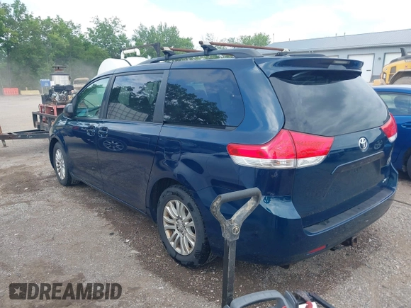 2011 Toyota Sienna XLE AAS with VIN 5TDYK3DC6BS045303, listed as a IAAI auction lot 42515203 with 205,904 mi miles and . Bid and sale history available at DreamBid. Image 3.