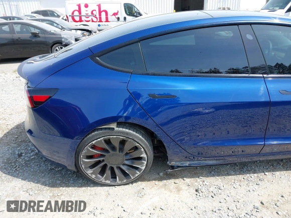 2021 Tesla Model 3 Performance with VIN 5YJ3E1EC1MF000961, listed as a IAAI auction lot 42110524 with 31,890 mi miles and . Bid and sale history available at carsss.com. Image 6.