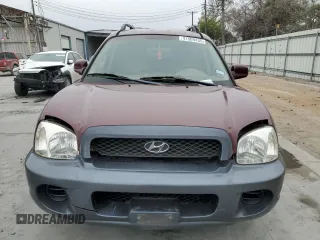 2004 Hyundai Santa Fe with VIN KM8SB12B14U644124, listed as a Copart auction lot 41509435 with 138,586 mi miles and Clean Title. Bid and sale history available at carsss.com. Image 5.
